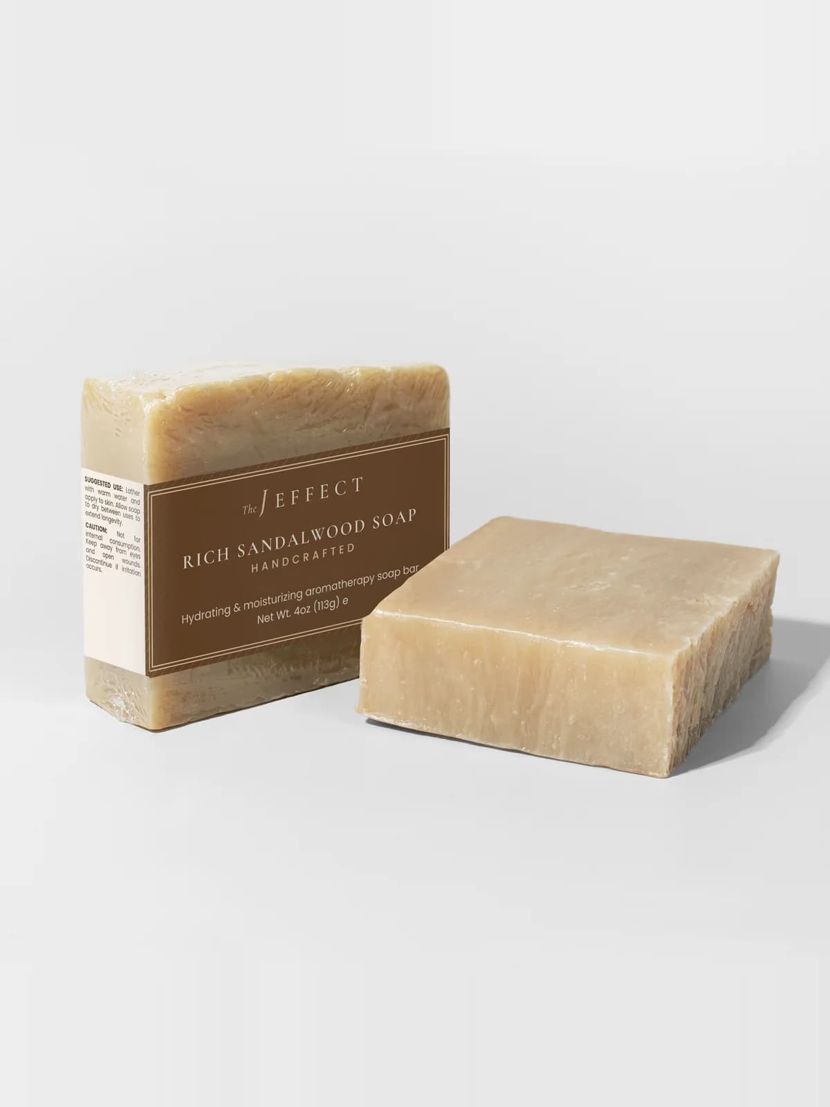 Sandalwood Ember with key ingredients: Organic Shea Butter, Organic Olive Oil, Sandalwood Accord