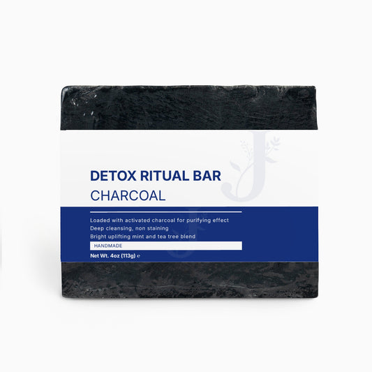 Detox ritual bar with charcoal on a white background